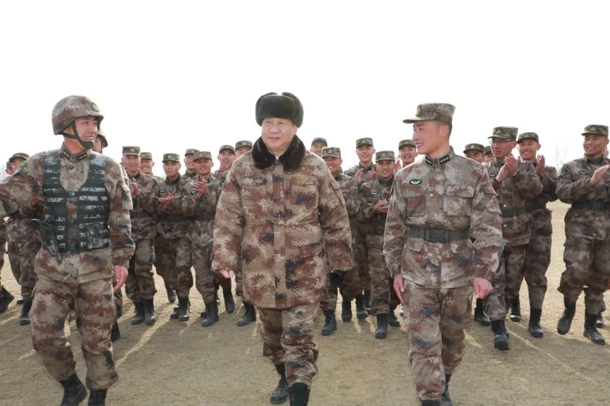 Chinese President Xi Jinping talks with officers and soldiers during inspection of People’s Liberation Army division in Central Theater Command,January 3, 2018, in Baoding, Hebei, China (Xinhua/Alamy/Li Gang)